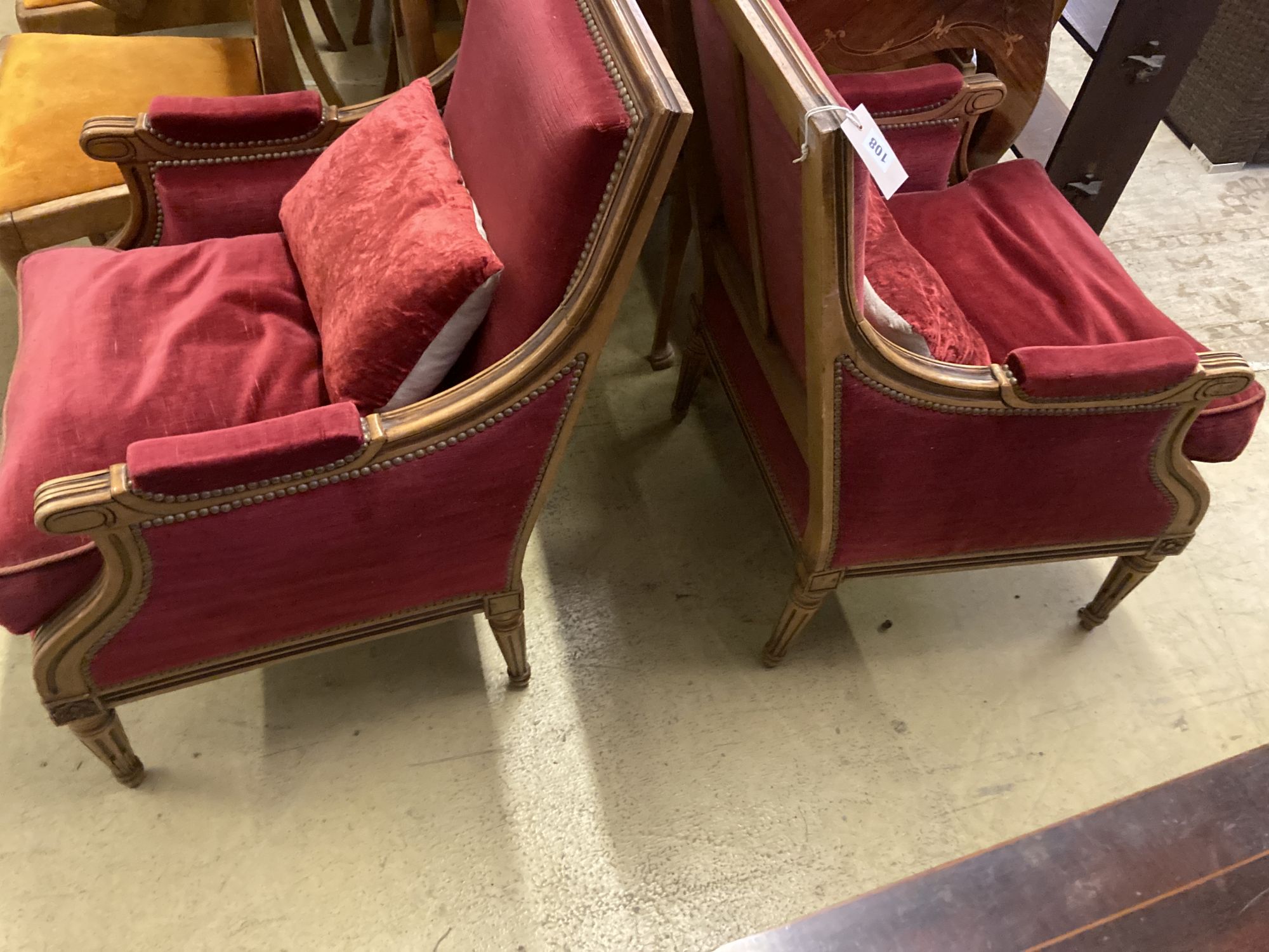 A pair of Louis XVI style upholstered mahogany armchairs, width 64cm, depth 70cm, height 93cm